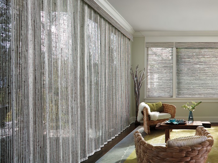 Provenance woven wood verticals closed over large living room windows
